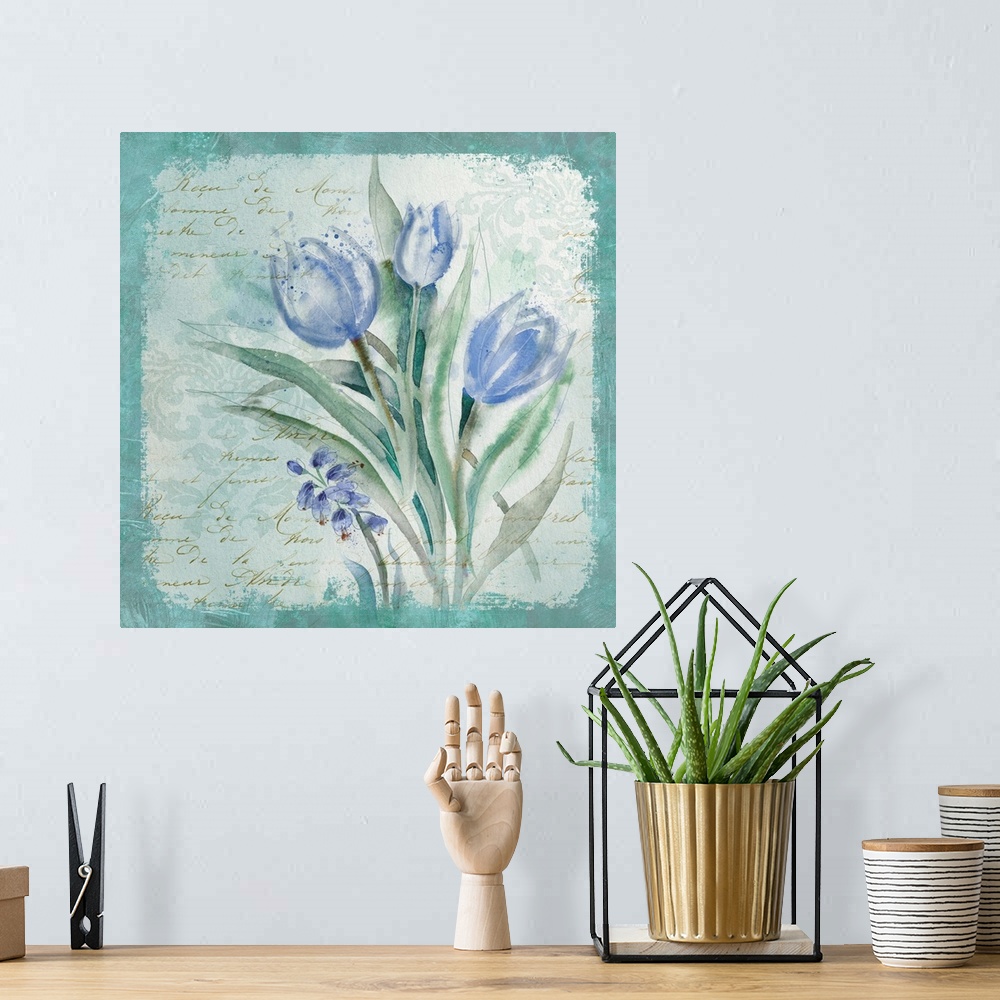 A bohemian room featuring Square decor in cool tones with abstract tulips on a blue bordered background with gold script.