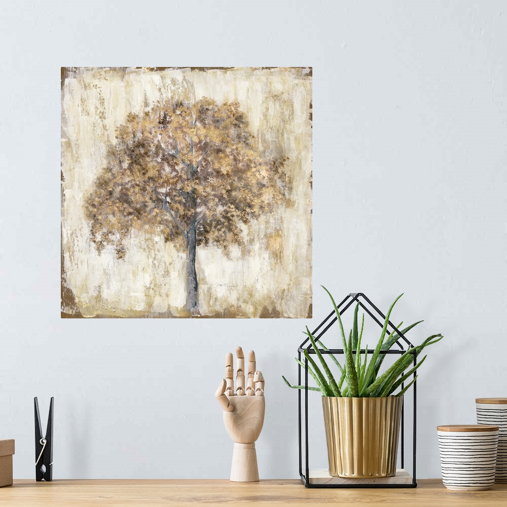 A bohemian room featuring Metallic gold and brown tree on a rustic cream background.