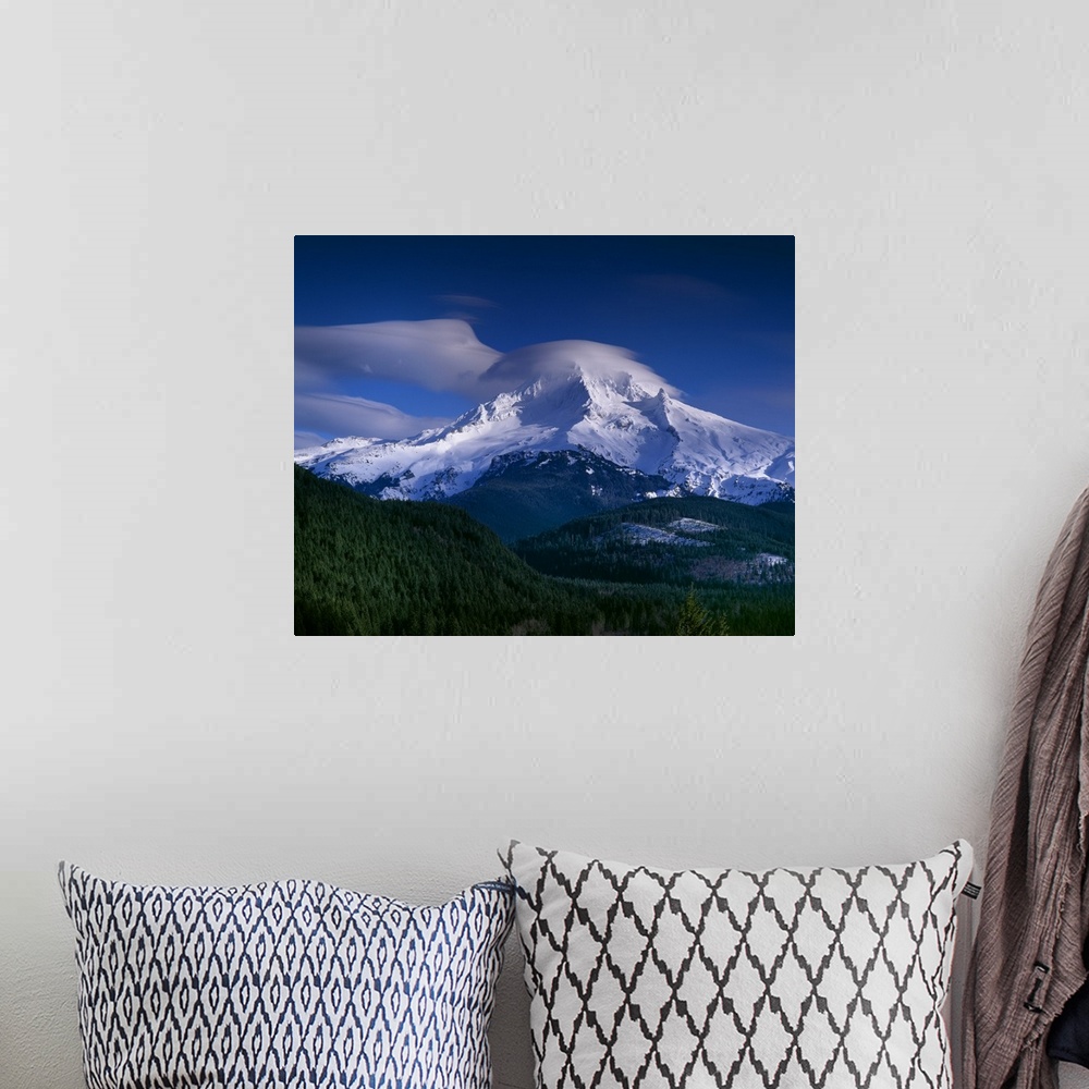 A bohemian room featuring Clouds covering the peak of Mount Hood in Oregon.