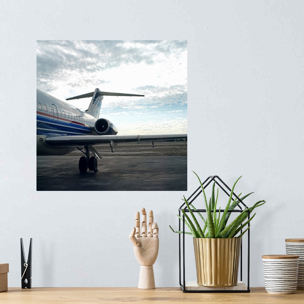 A bohemian room featuring Airplane on the runway of an airport