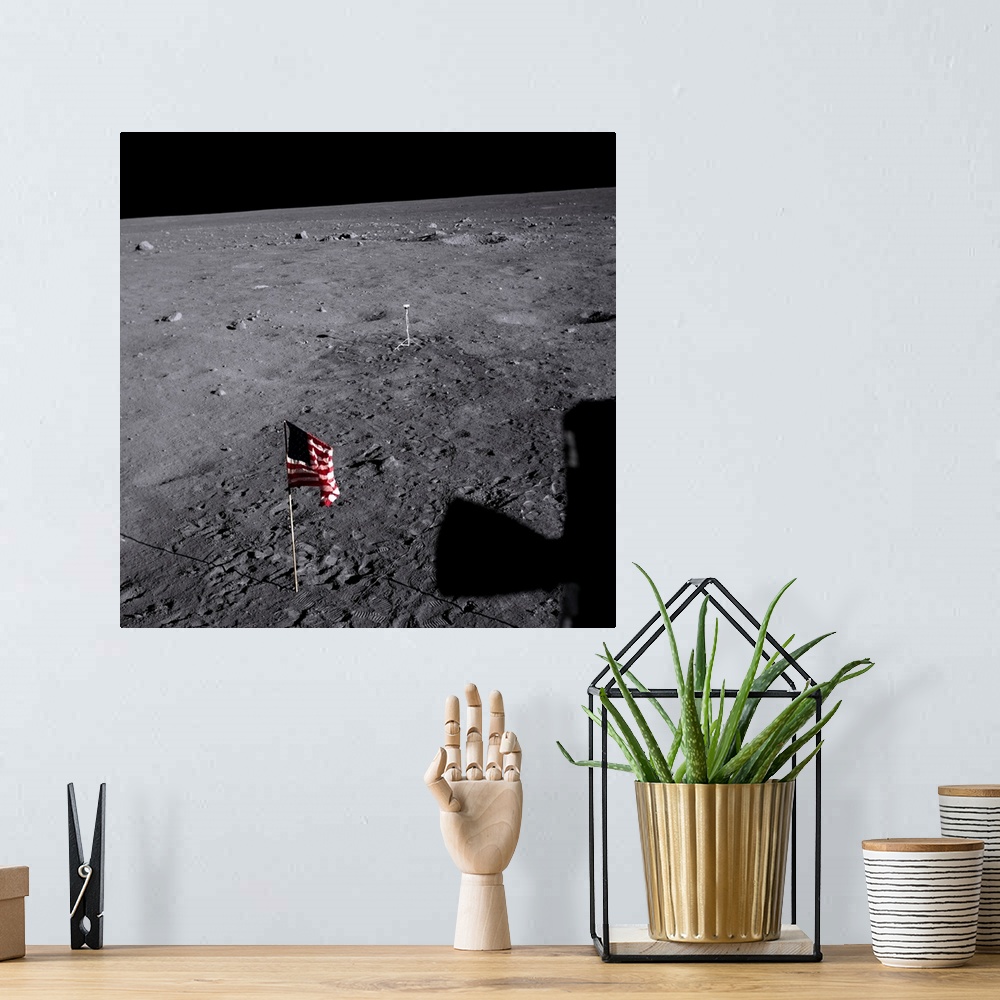 A bohemian room featuring The American flag at Tranquility Base on the Moon, planted by the Apollo 11 astronauts.