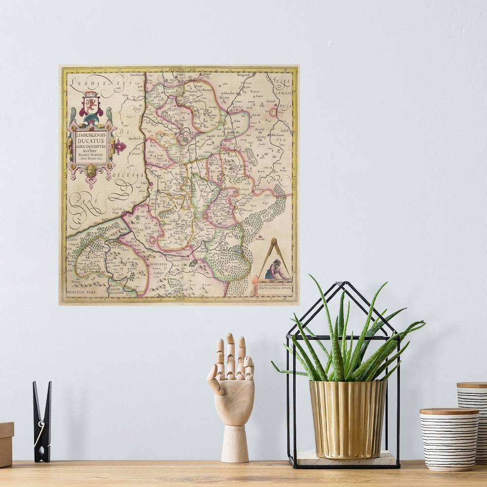 A bohemian room featuring Antique map of Belgium and the Netherlands