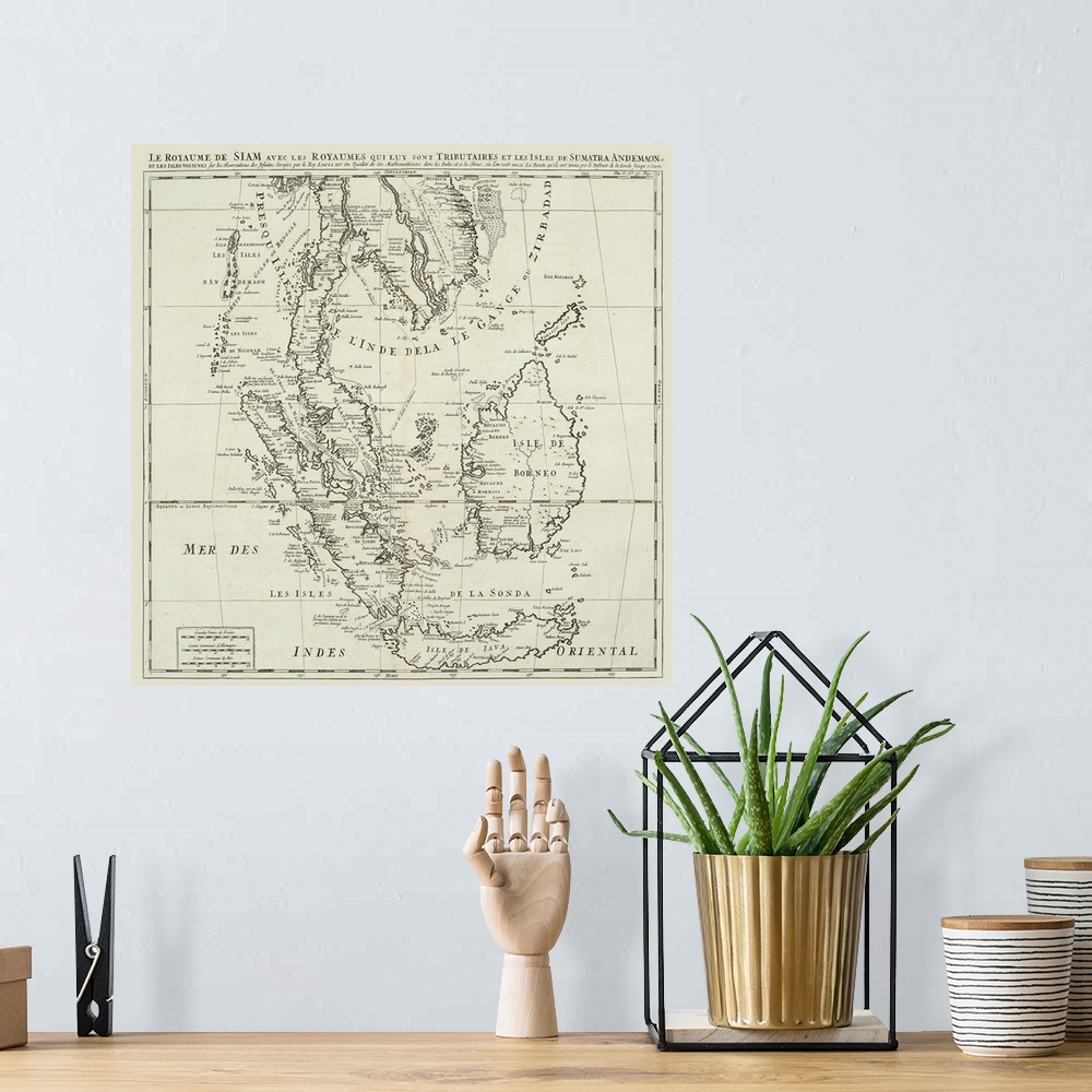 A bohemian room featuring Antique map of Indonesian islands and Siam
