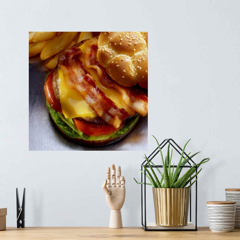 A bohemian room featuring Bacon cheeseburger with french fries