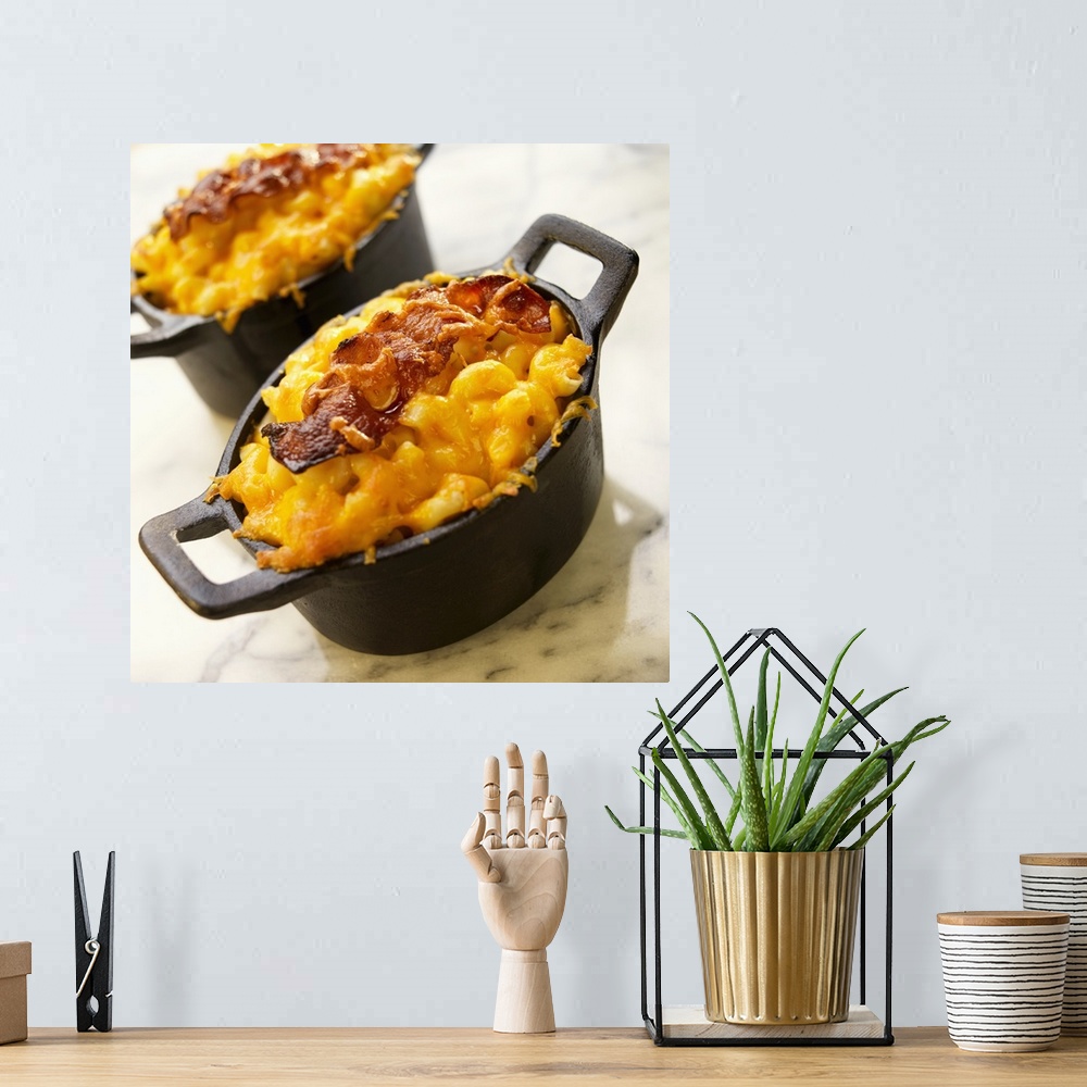 A bohemian room featuring Macaroni and cheese with bacon in casserole, close-up
