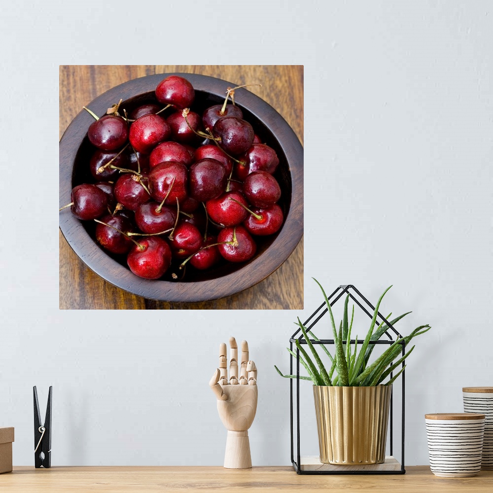 A bohemian room featuring Cherries in wooden bowl