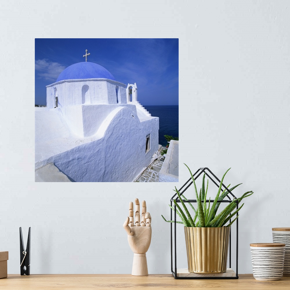 A bohemian room featuring Church with blue dome in Santorini, Greece