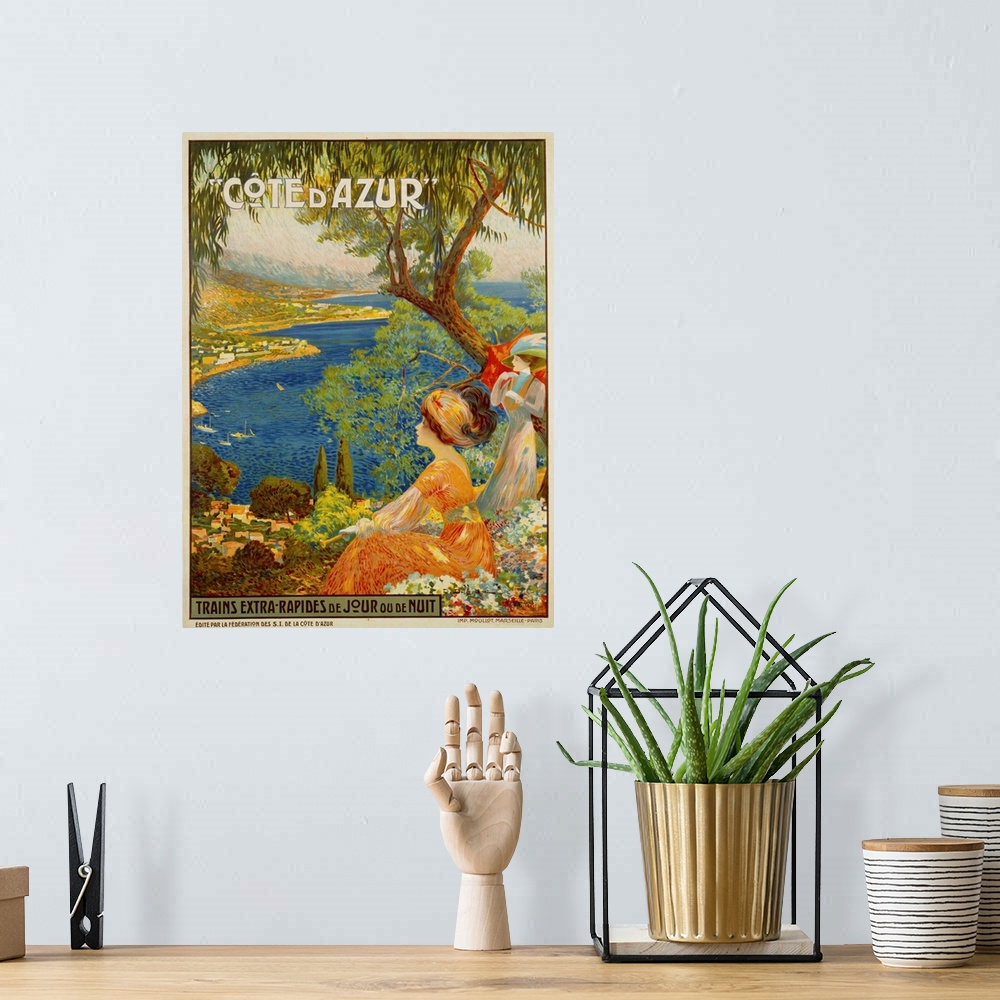 A bohemian room featuring Cote D'Azur Travel Poster By David Dellepiane
