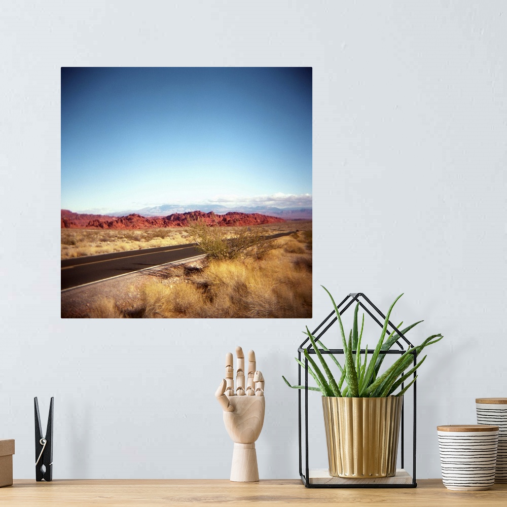 A bohemian room featuring Photo of the highway entering the Valley of Fire in Nevada.  Near Las Vegas.  Red rocks.  Desert....