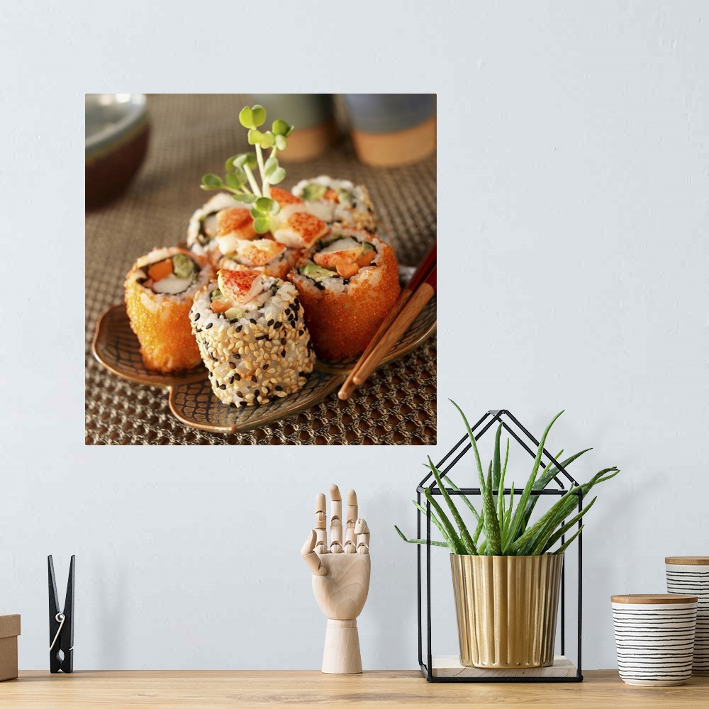 A bohemian room featuring Lobster sushi rolls on plate