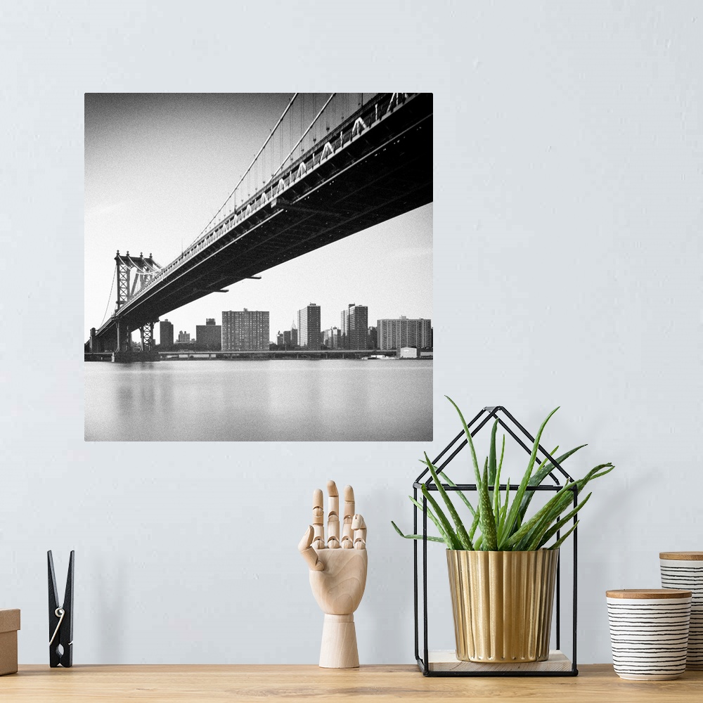 A bohemian room featuring Manhattan Bridge and skyline, New York, US.