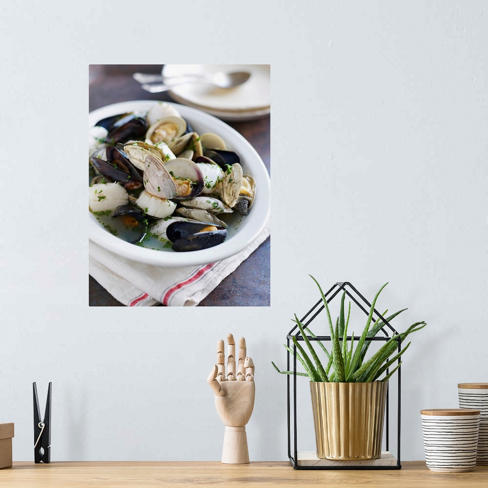 A bohemian room featuring Mussels, scallops, clams in broth