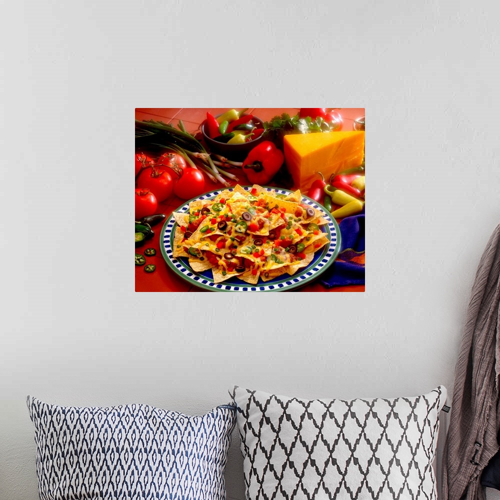 A bohemian room featuring Horizontal photograph on a big canvas of a plate of loaded nachos, the fresh ingredients used on ...