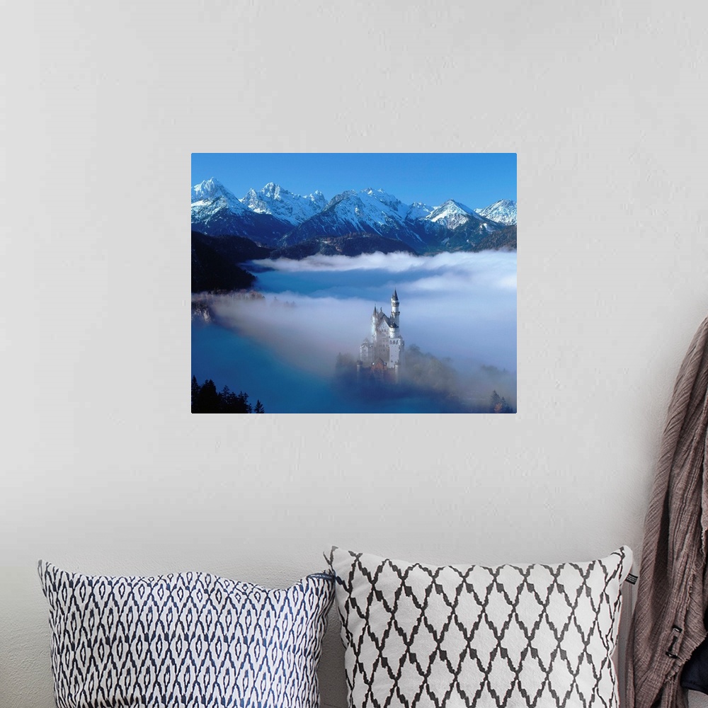 A bohemian room featuring Neuschwanstein Castle Surrounded In Fog