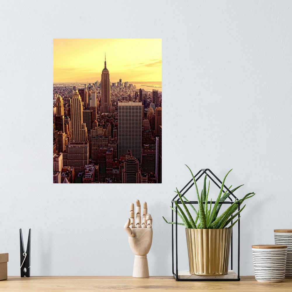 A bohemian room featuring Vertical Panoramic photograph of the "Big Apple" at sunset.
