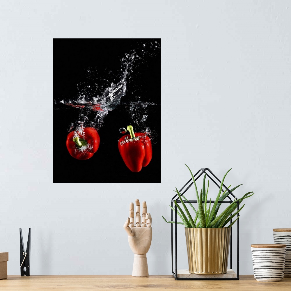 A bohemian room featuring red pepper splashing in water