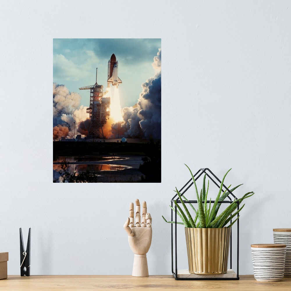 A bohemian room featuring The seventh launch of the Space Shuttle and the second lift-off of the Orbiter Challenger occurre...