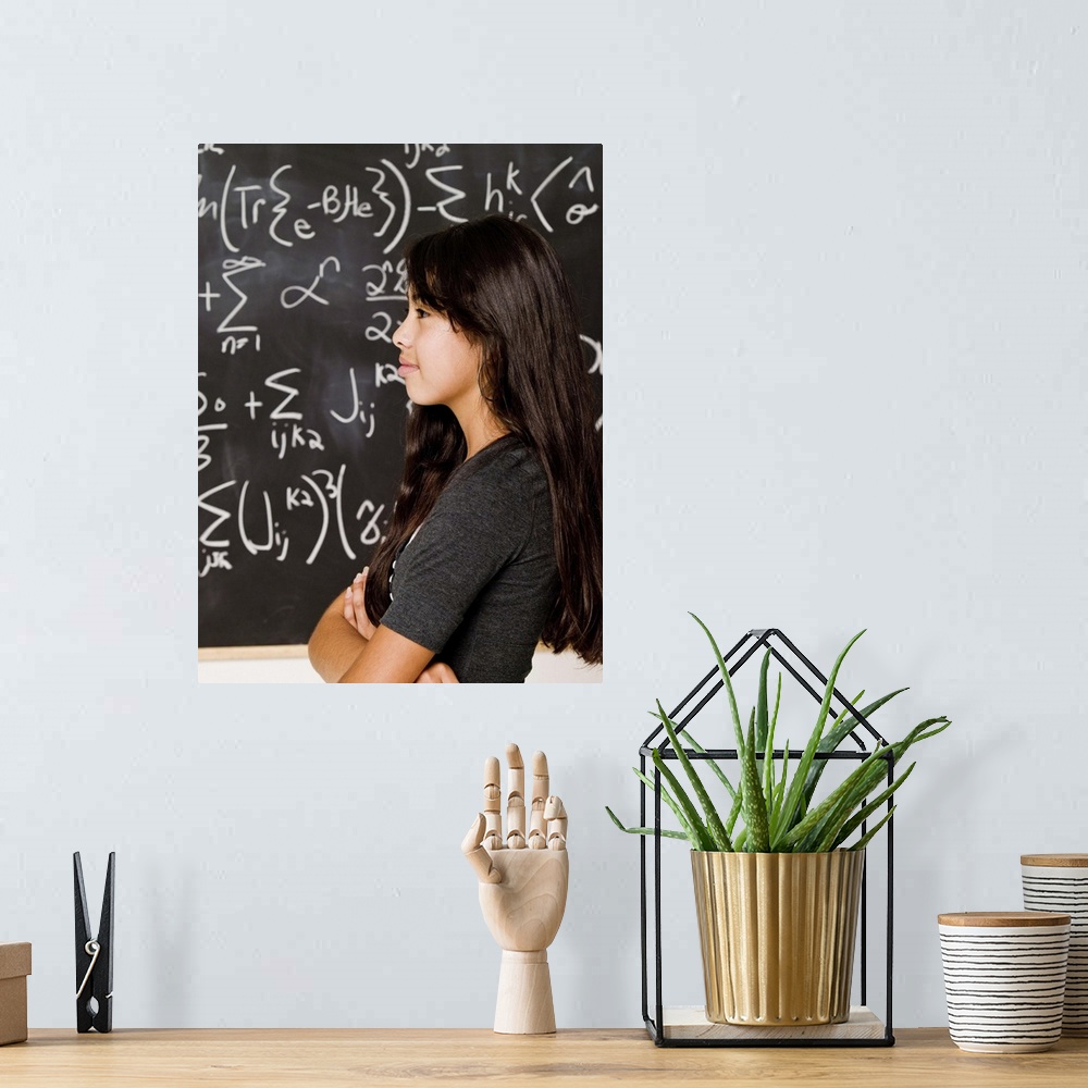 A bohemian room featuring Teenage girl student at blackboard with math equations