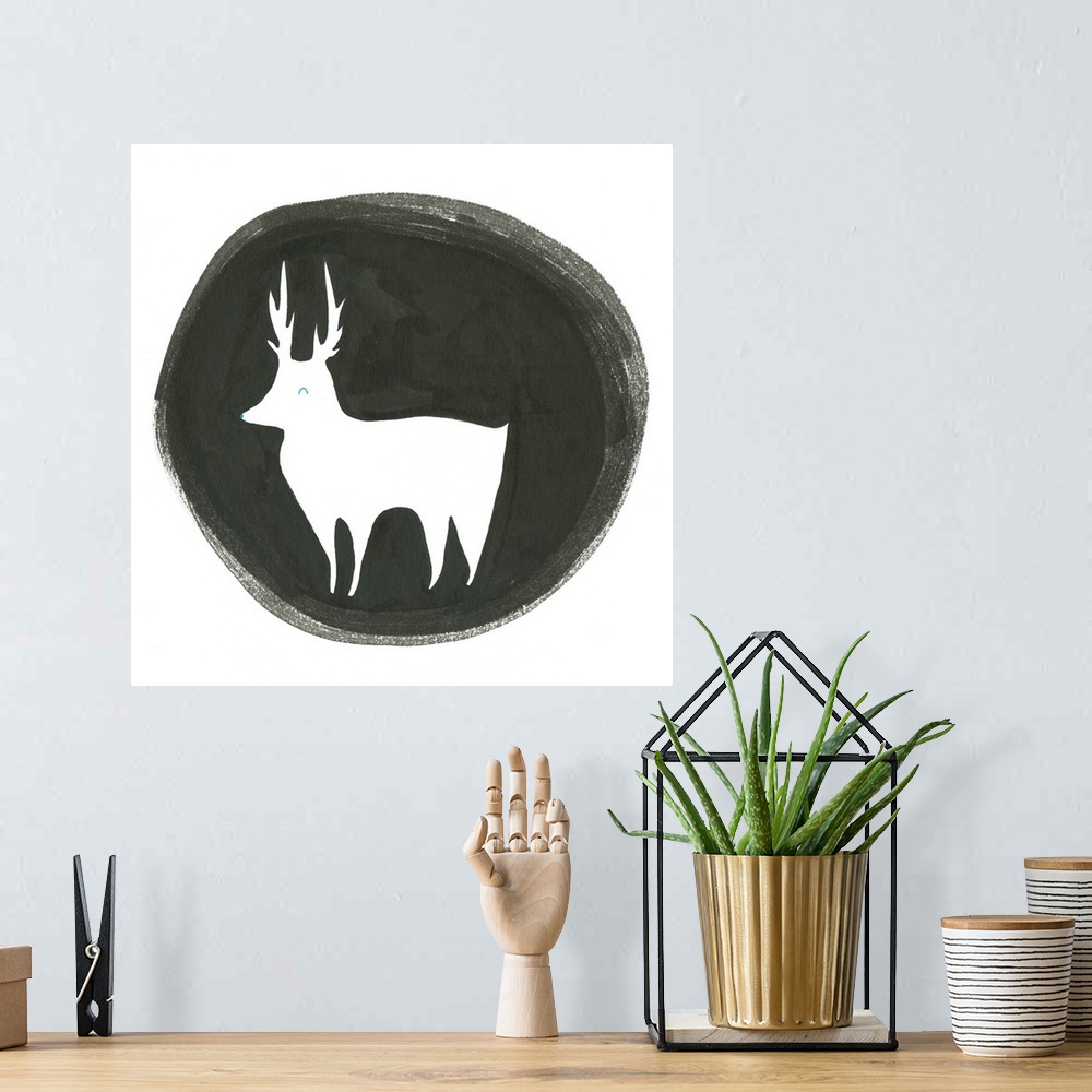 A bohemian room featuring A reindeer outlined with a black watercolor circle.