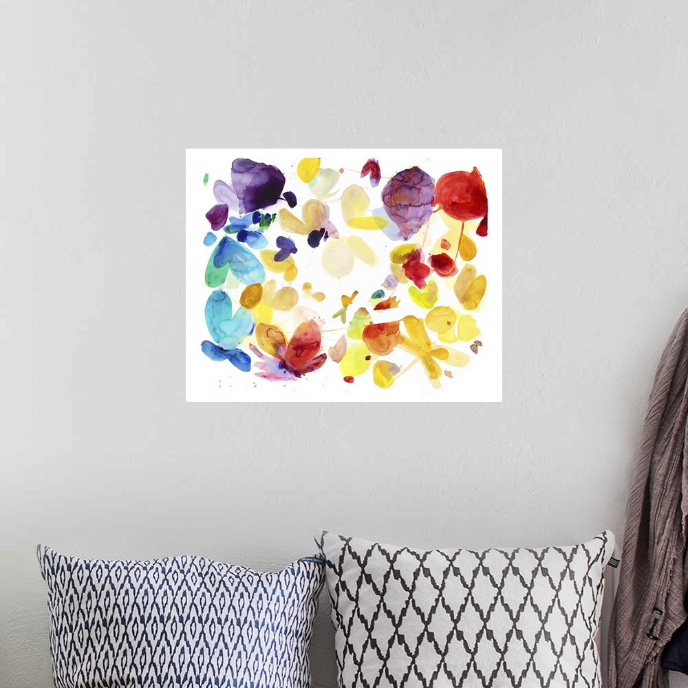 A bohemian room featuring Watercolor painting resembling fallen flower petals in rainbow colors.