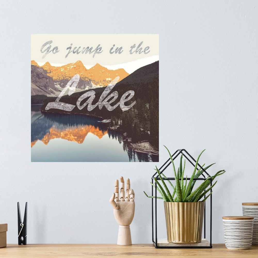 A bohemian room featuring The phrase "go jump in the lake" in script over an image of a mountain lake at sunset.
