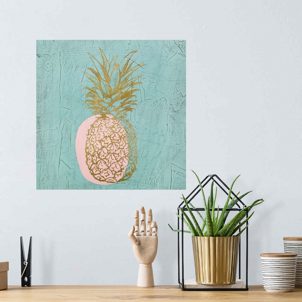 A bohemian room featuring Square painting of a metallic gold pineapple with a pink shadow on a textured teal background.