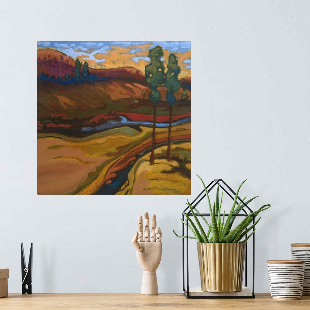 A bohemian room featuring Contemporary landscape painting of a river valley in autumn colors.