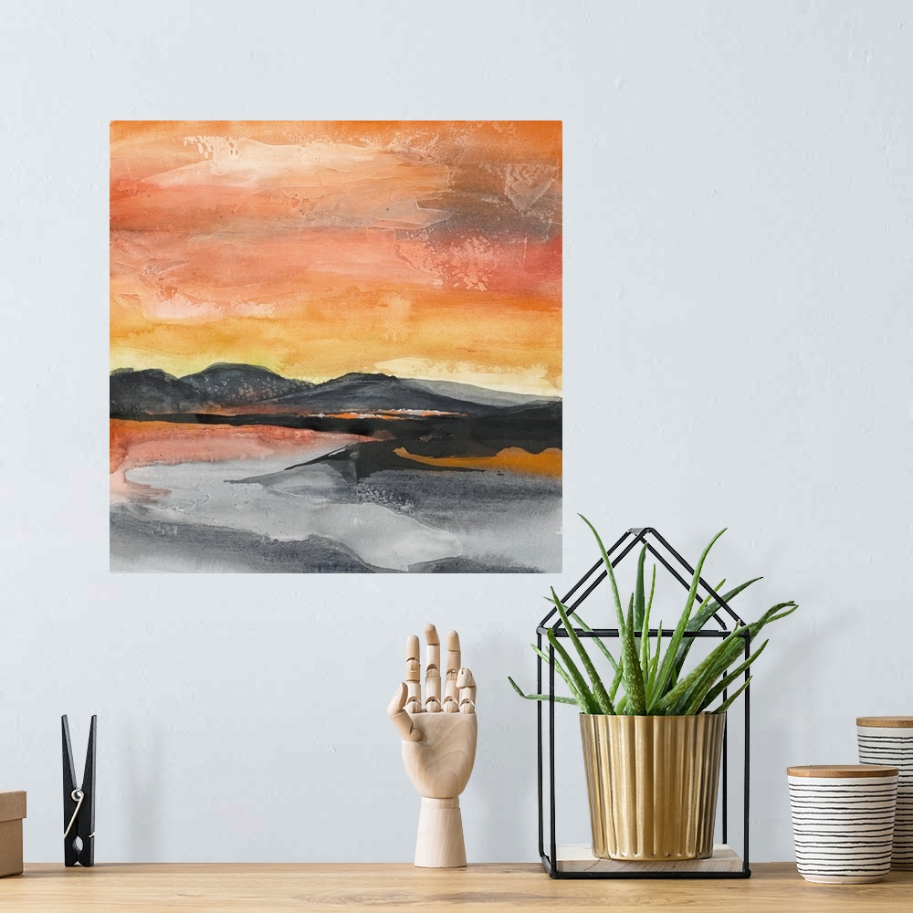A bohemian room featuring Square abstract painting of a mountainous landscape in New Mexico with a fiery red and orange sky.