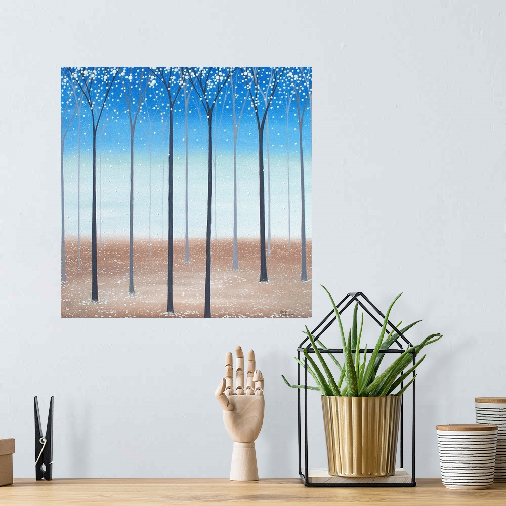 A bohemian room featuring Square minimalist painting of tall, skinny trees with white blossoms falling to the ground.