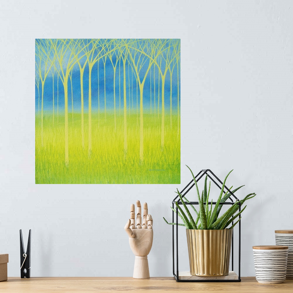 A bohemian room featuring Painting of yellow trees on a blue and lime green background.