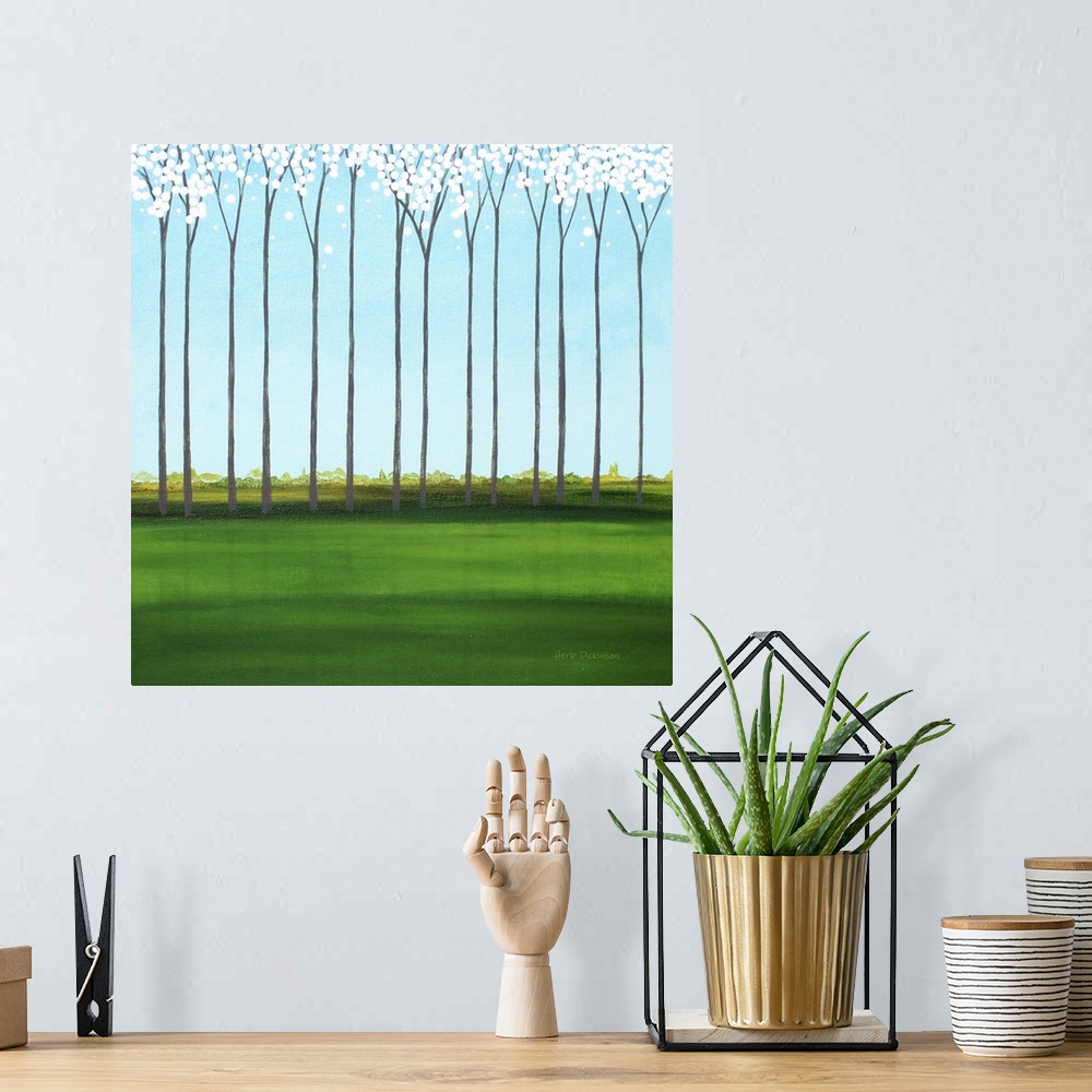 A bohemian room featuring Square minimalist painting of tall, skinny trees with white blossoms.
