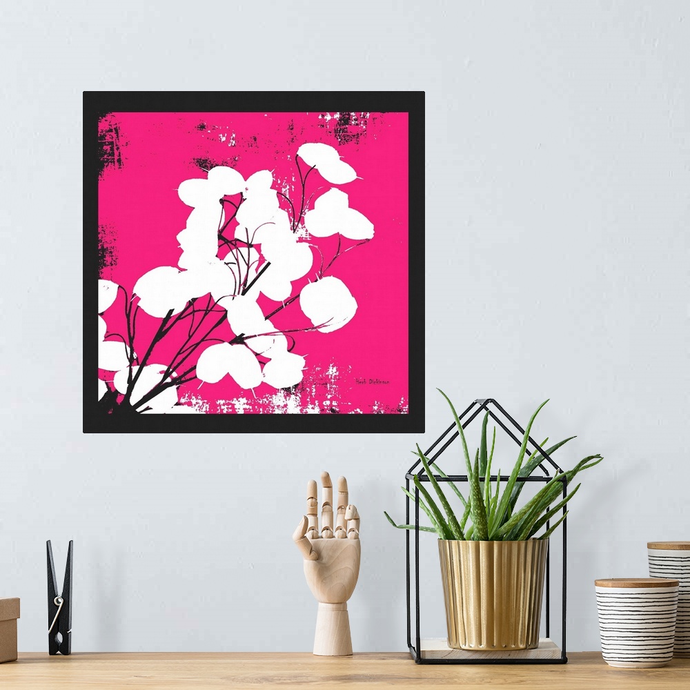 A bohemian room featuring Square silhouetted painting of a money plant in black, white, and pink.