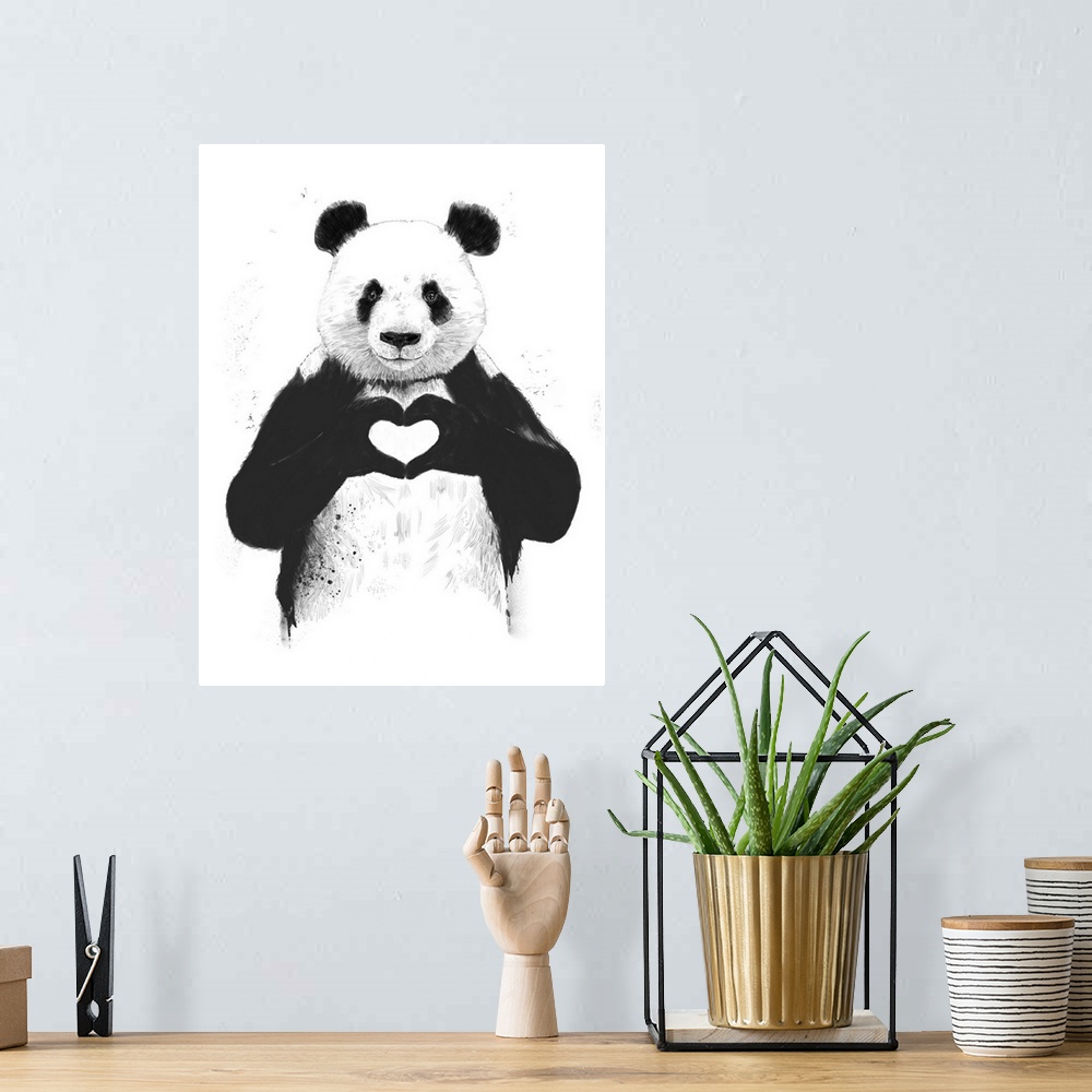 A bohemian room featuring A contemporary illustration of a panda bear holding up paws to make a heart shape.