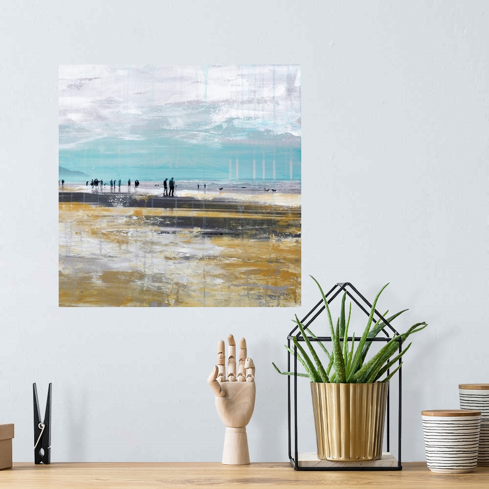 A bohemian room featuring Square mixed media artwork of people walking along a beach.