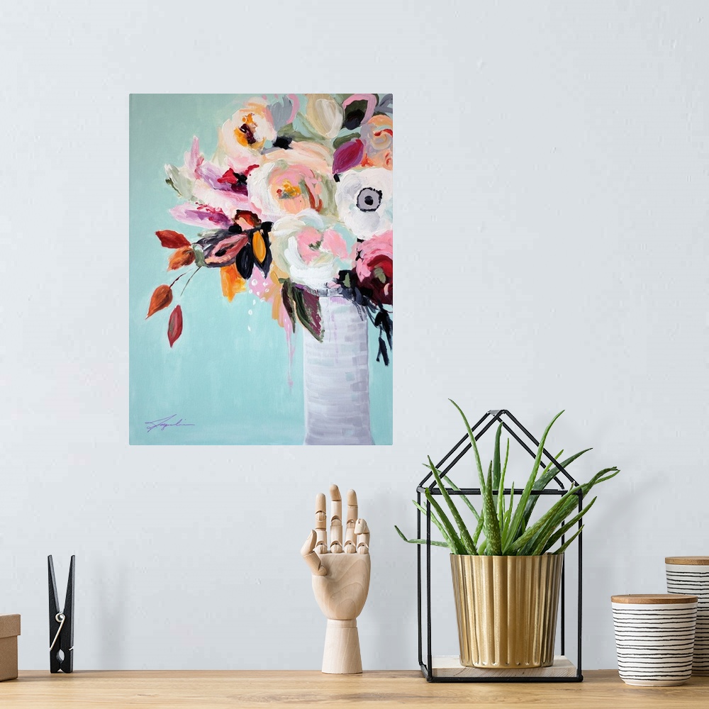A bohemian room featuring A contemporary painting of a vase of flowers in pastel colors.