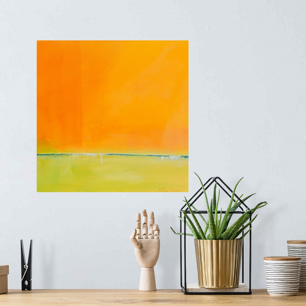 A bohemian room featuring Contemporary abstract painting in bright orange and yellow-green.