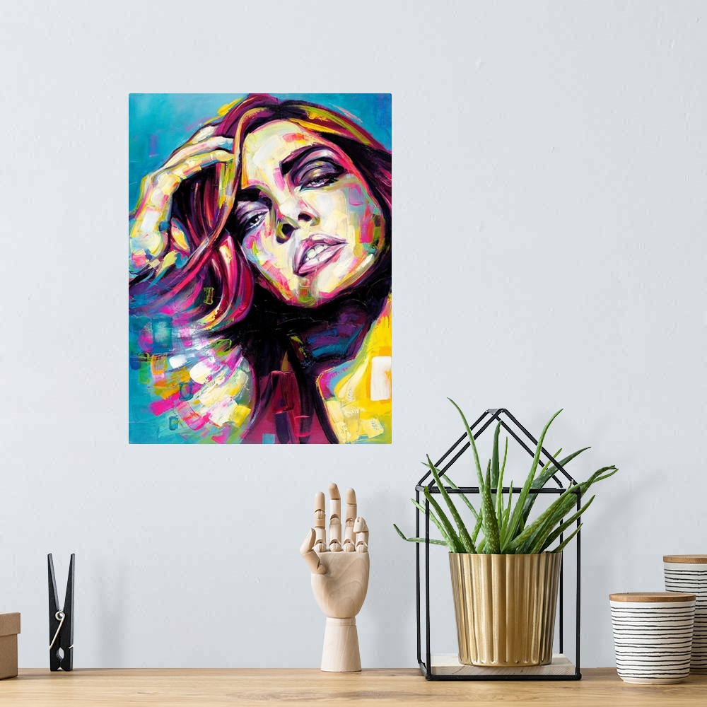 A bohemian room featuring Vertical abstract portrait of a woman in vibrant colors.