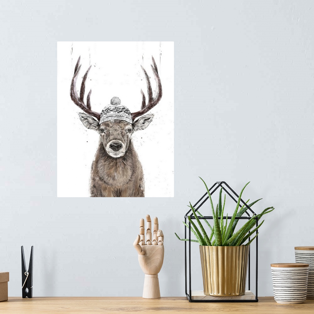 A bohemian room featuring Portrait of a deer ready for winter in his hat.