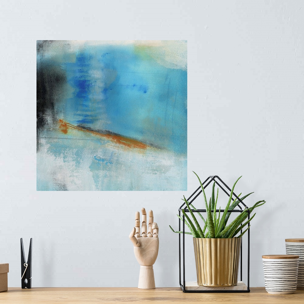 A bohemian room featuring A contemporary abstract painting  using predominantly blue