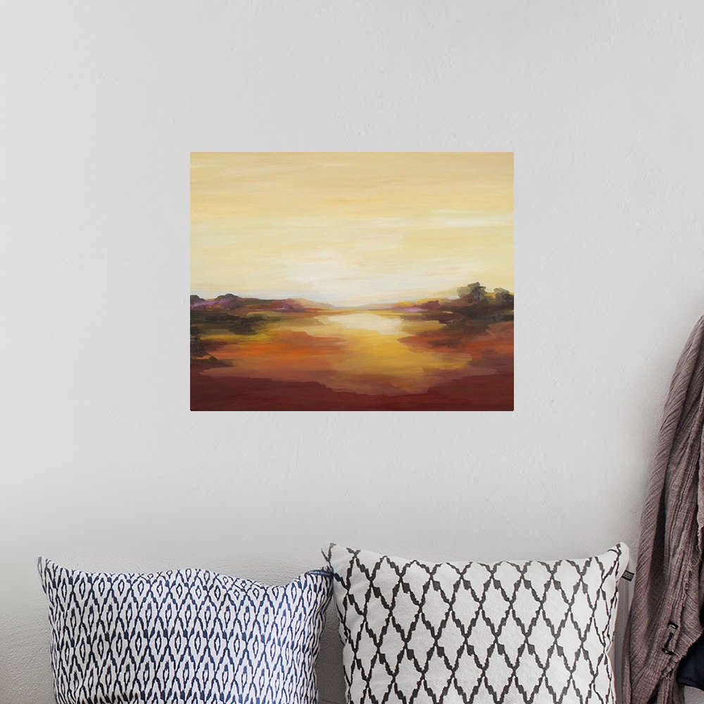 A bohemian room featuring A contemporary abstract painting of a red landscape under a pale yellow sky.