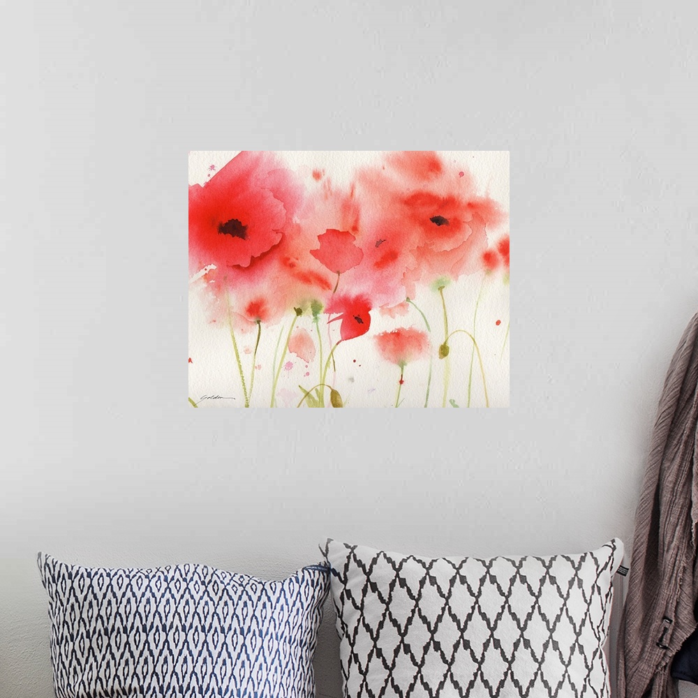 A bohemian room featuring A horizontal watercolor painting of red poppies.