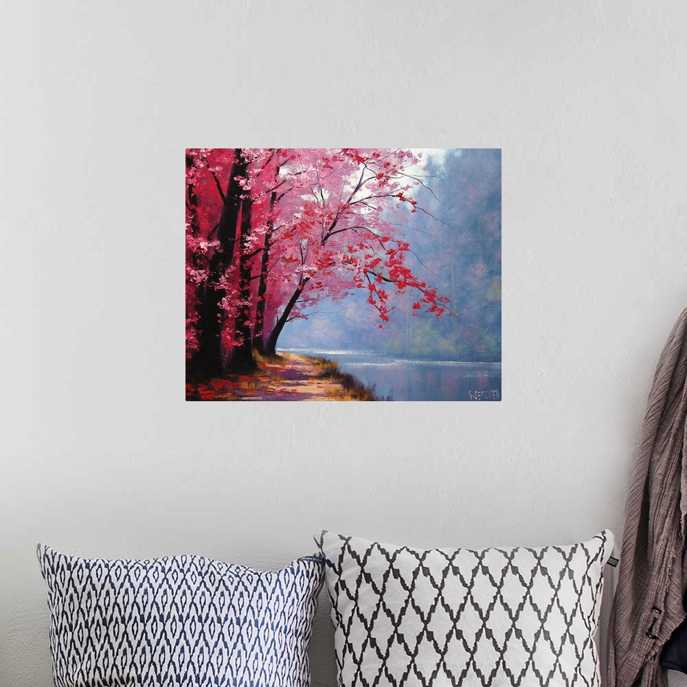 A bohemian room featuring Contemporary painting of an idyllic countryside river scene, with pink autumn foliage.