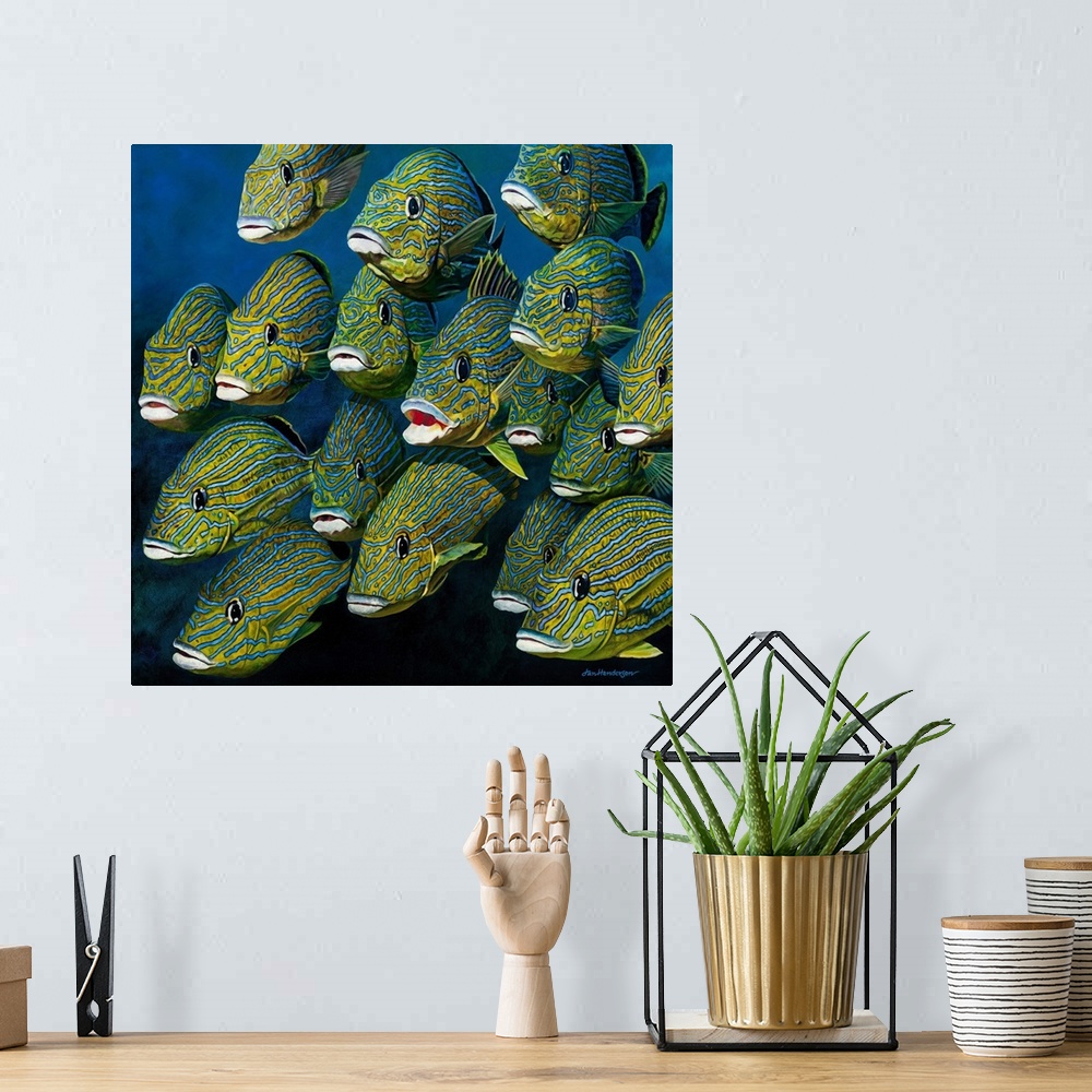 A bohemian room featuring A square painting of a shoal of colorful Grunts.