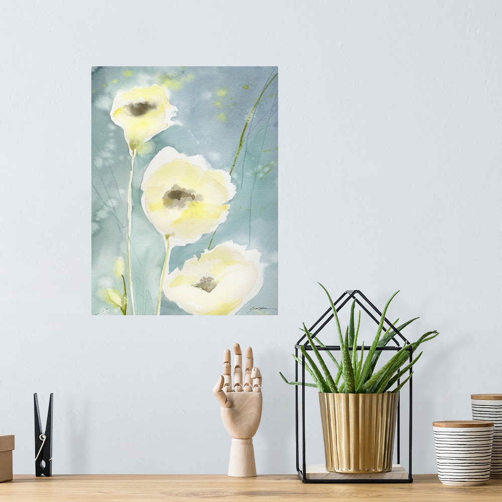 A bohemian room featuring A vertical watercolor painting of delicate yellow flowers against a teal backdrop.