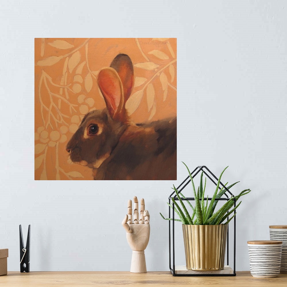 A bohemian room featuring Contemporary painting of a brown rabbit with long ears in front of an orange wall.