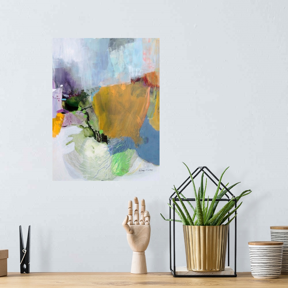 A bohemian room featuring A vertical abstract painting of shapes in yellow, purple and blue with textured lines.