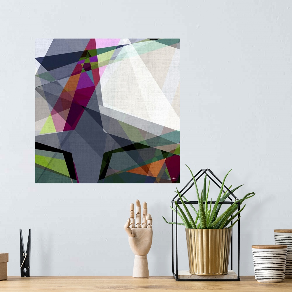 A bohemian room featuring A collage of intersecting angles of rich contemporary color.