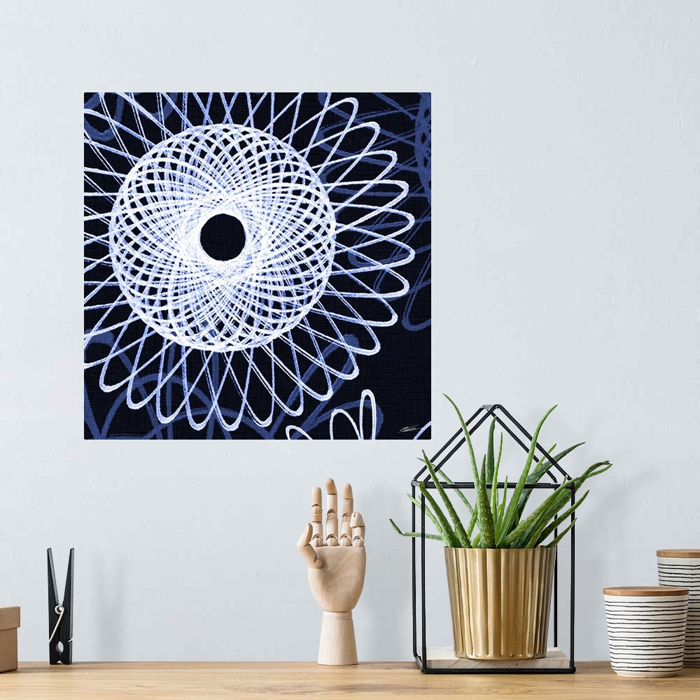 A bohemian room featuring A blueprint of geometric spirals floating on an indigo field.