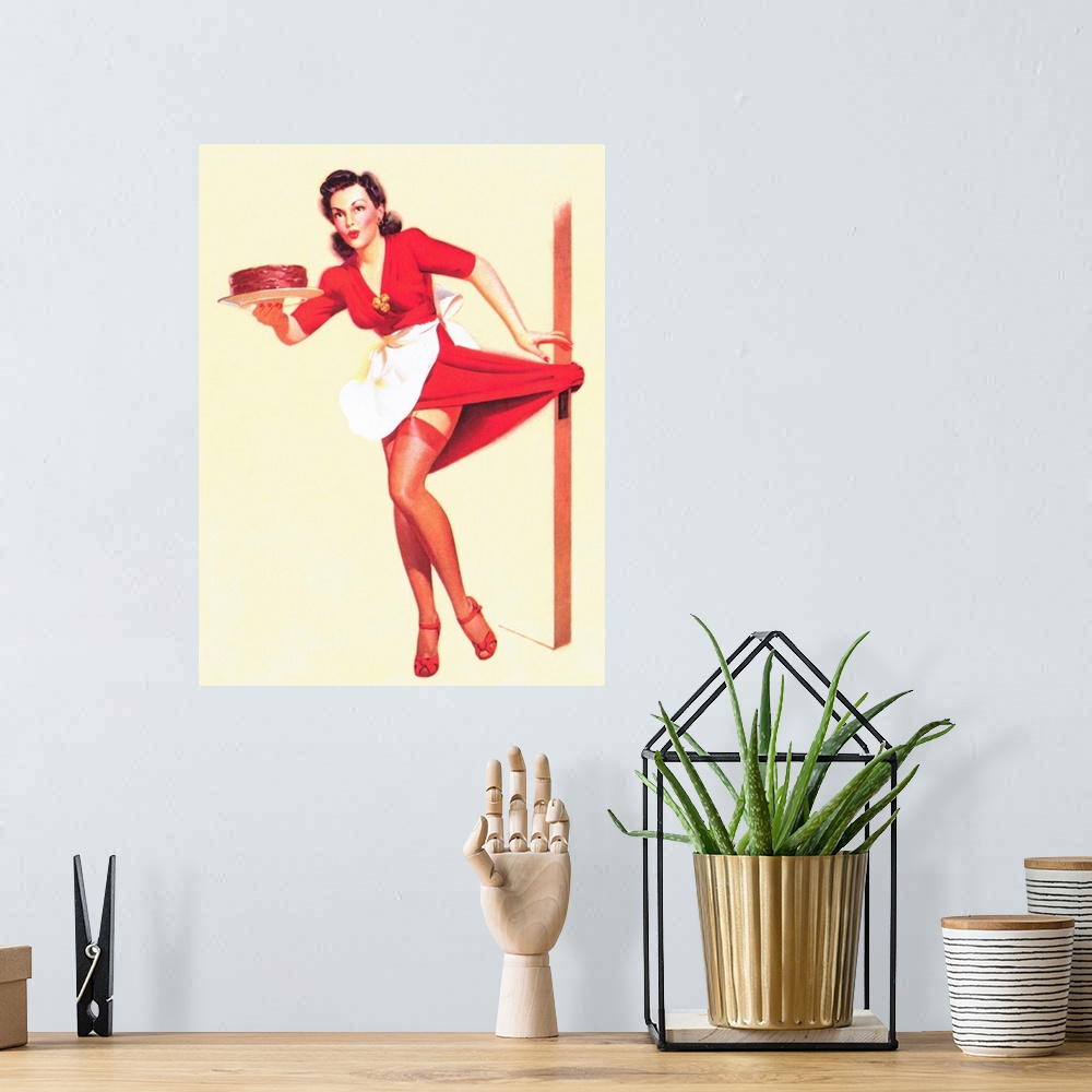 A bohemian room featuring Vintage 50's pin-up girl holding a cake with her dress caught on the door knob.