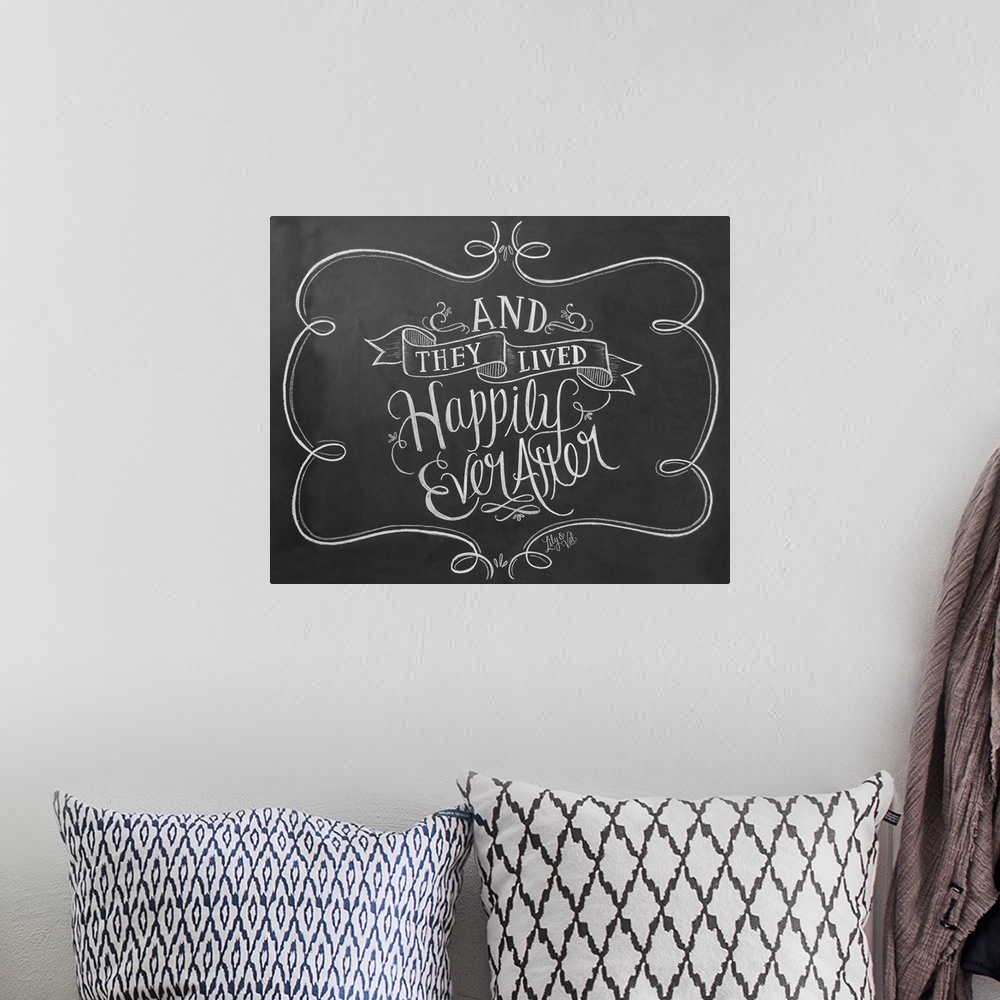 A bohemian room featuring "And they lived happily ever after" handwritten in white chalk on a black background.